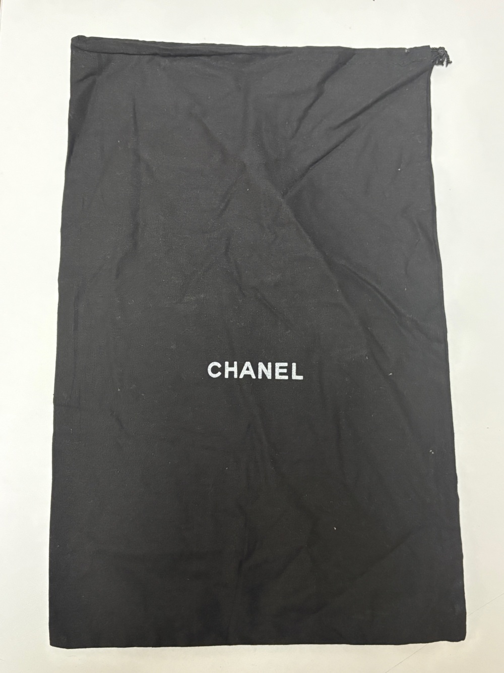 CHANEL Black and White Logo Dust Bag